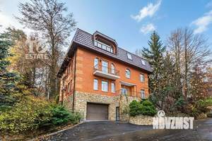 Дом 472м², 4-этажный, участок 8 сот.