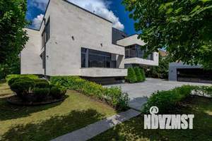 Коттедж 1000м², 3-этажный, участок 21 сот.  