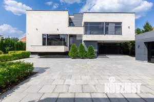 Коттедж 1000м², 3-этажный, участок 21 сот.  