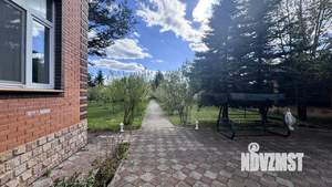 Коттедж 445м², 3-этажный, участок 15 сот.  