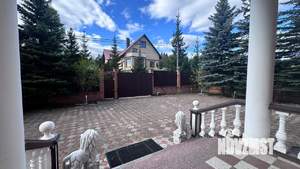 Коттедж 445м², 3-этажный, участок 15 сот.  