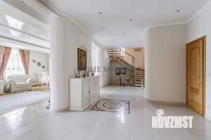 Коттедж 497м², 3-этажный, участок 15 сот.  