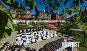 Коттедж 310м², 3-этажный, участок 7 сот.  