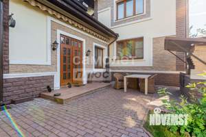 Коттедж 475м², 3-этажный, участок 20 сот.  